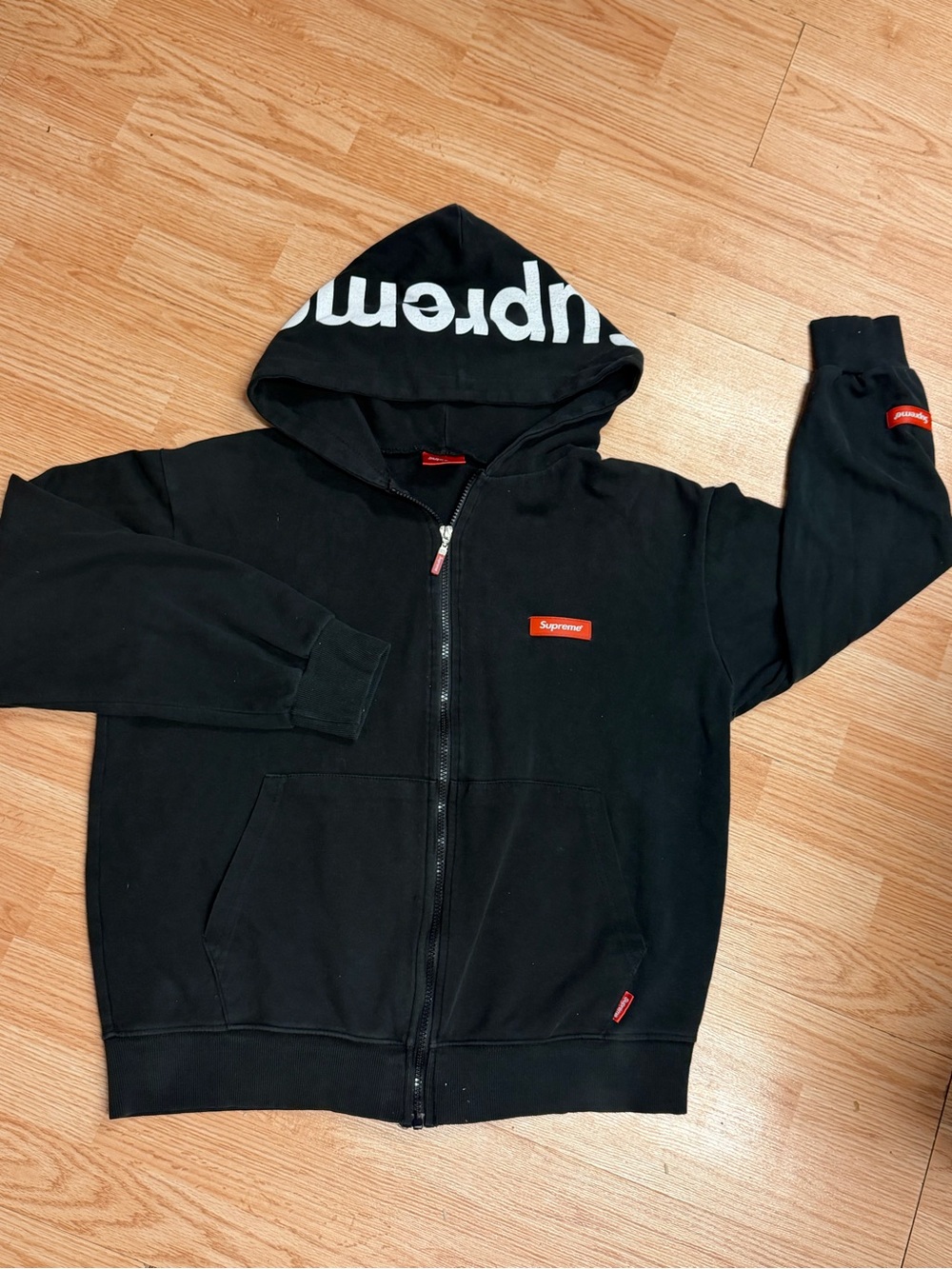 Supreme Black Zip Front Hoodie with White Hood Logo